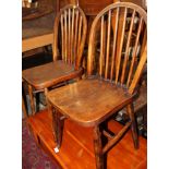 Four Windsor spindle back dining chairs with panel seats