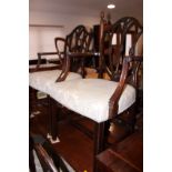 A set of eight mahogany Sheraton design shield back chairs