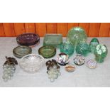 A pair of bubble glass inkwells, a bubble glass doorstop, an ashtray, paperweights and other