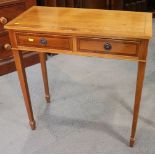 A yew wood two drawer side table, 29" wide, and a yew bedside chest of two short and three long