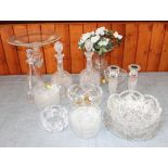 A pair of curt glass decanters, an Orrefors glass vase, 3 1/4" high, a pair of glass candlesticks, a