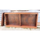 An early 20th century mahogany low open bookcase, fitted adjustable shelves, on block base, 90" wide
