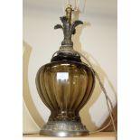 A smoky glass table lamp with metal acanthus leaf design, 24" high