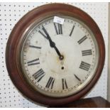 An Ansonia oak cased dial clock with Roman numerals