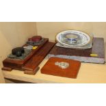 A marble plaque for the Normandy Veteran's Society, a desk inkwell with military insignia, an oak