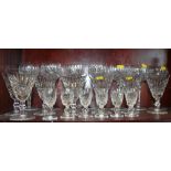 Seven Waterford crystal tall stemmed hock glasses, seven smaller wines with conical bowls and six