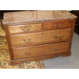 A walnut chest of two short and two long drawers with marble top, 41" wide x 28" high x 18" deep