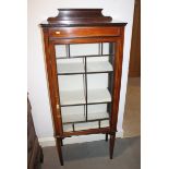 An Edwardian mahogany and line inlaid ledge back display cabinet, on square taper supports, 23"