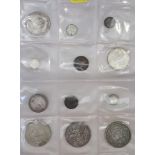 A collection of British pre-decimal coinage, including a 1930 wreath crown, an 1889 silver crown and