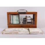 A Barograph, in walnut case with plaque "Satanita, Nice, 6 Avril 1896", and graph paper, in box