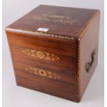 A rosewood and inlaid liqueurs box with part fitted interior