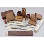 An Asprey leather candle holder, a cigar case, a shot glass case, an ivory on leather strop, a