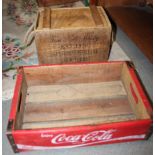 A Coca-Cola wooden tray and a wooden whisky box