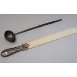 An ivory page turner with embossed white metal handle and a Georgian silver toddy ladle with twisted