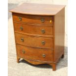 A walnut bowfront chest of four long drawers with ring handles, on bracket feet, 34" wide x 30" high