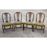 Four George III design standard dining chairs with stuffed over seats, on square taper stretchered