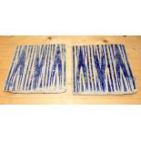 A pair of Iznik blue and white tiles, 8" square