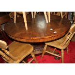 A mid Victorian rosewood circular tilt top loo table, on square column and quadraform base, 48"