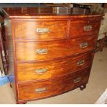 A late 19th century mahogany bowfront chest of two short and three long drawers with Aesthetic