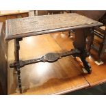 An early 18th century chip carved coffer with triple panel lid, on moulded stile supports (retaining