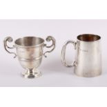 A silver half-pint mug and a silver two-handled trophy cup, 11.4oz troy approx