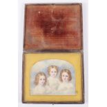 A late 19th century miniature portrait painting of three young girls, in gilt mount and morocco