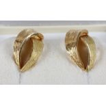 A pair of 18ct gold ear clips with textured decoration, 7.3g gross