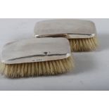 A pair of silver mounted hairbrushes