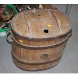 A coopered oak and metal mounted washing barrel, 18" high