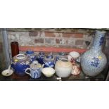 A Chinese blue and white bottle vase, 16" high (heavily restored), a collection of ginger jars,