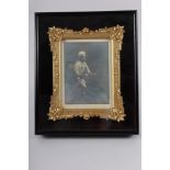 A late 19th century black and white photograph portrait of an old woman, 11" x 9.5", in ebonised and