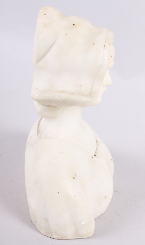 A white marble bust of a young woman, 6 1/2" high (restorations) - Image 4 of 5