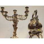 A pair of 19th century silver plated three-branch candelabra and a plated Britannia metal kettle, on