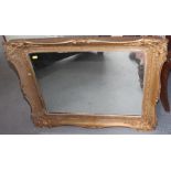 A gilt framed rectangular wall mirror, plate 18 1/2" x 23 1/4"