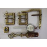 Three 19 century brass hinged buckles, a brass "devil drink" bottle stopper, a brass thread gauge