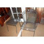 A metalwork mesh table and a pair of matching armchairs, table 41" x 75"