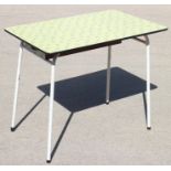 A 1960s Formica top table, on white painted tubular metal supports with later drawer