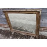 A rectangular ornate gilt framed wall mirror, plate 28 1/2" x 38 1/4"