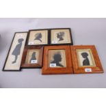 Baron Scotford: papercut silhouette, in ebonised frame, a pair of silhouettes, in maple frames and
