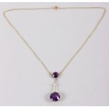 A late 19th century yellow metal amethyst and seed pearl necklace, stamped 15ct
