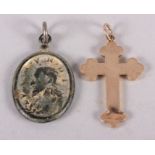 A pilgrim's bronze gilt 17th century pendant and a yellow metal cross, stamped 9ct