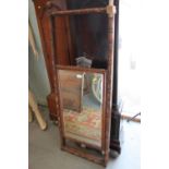 A mahogany adjustable cheval mirror with bevelled glass, 57" x 20 1/2" overall
