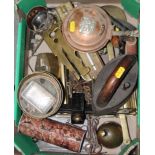 An assortment of metalware, including a coffin-shaped brass box, a servant's bell, a jam