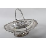 A silver fruit basket with vine embossed rim, 24oz troy approx