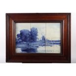 A 1920s Delft blue and white panel, landscape with Windmill, 12" x 18", in oak frame