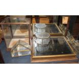 A tabletop glass and wooden mounted display case, 16" wide, a similar rectangular display case,