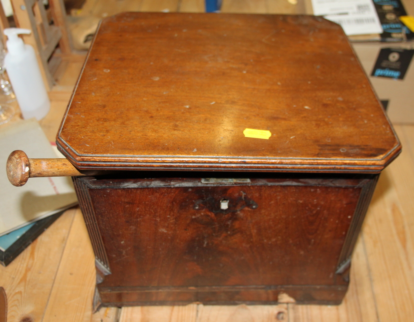 A mahogany box with reeded chamfered edges and brass carrying handles, 13" square, two pairs of