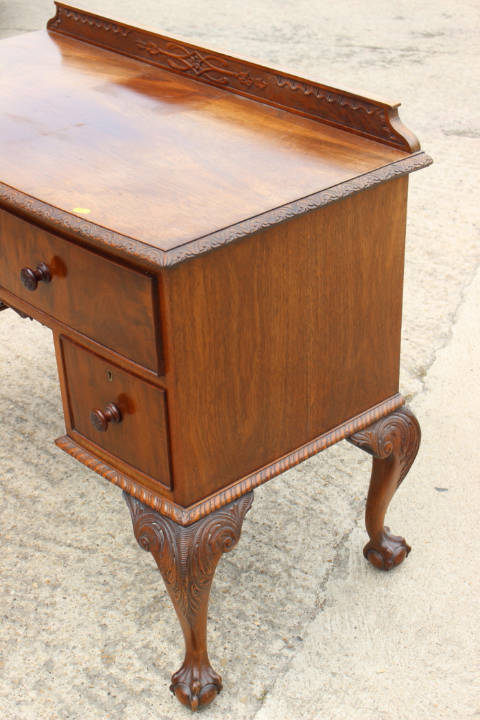 A walnut bowfront desk, fitted one long and two deep drawers, on carved cabriole claw and ball - Image 4 of 4