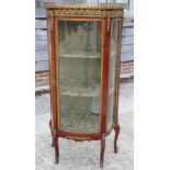A Louis XVI design polished as mahogany shape front display cabinet/vitrine with brass gallery and