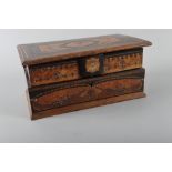 A Continental walnut, ebony and inlaid jewel casket, 10? wide (damages)